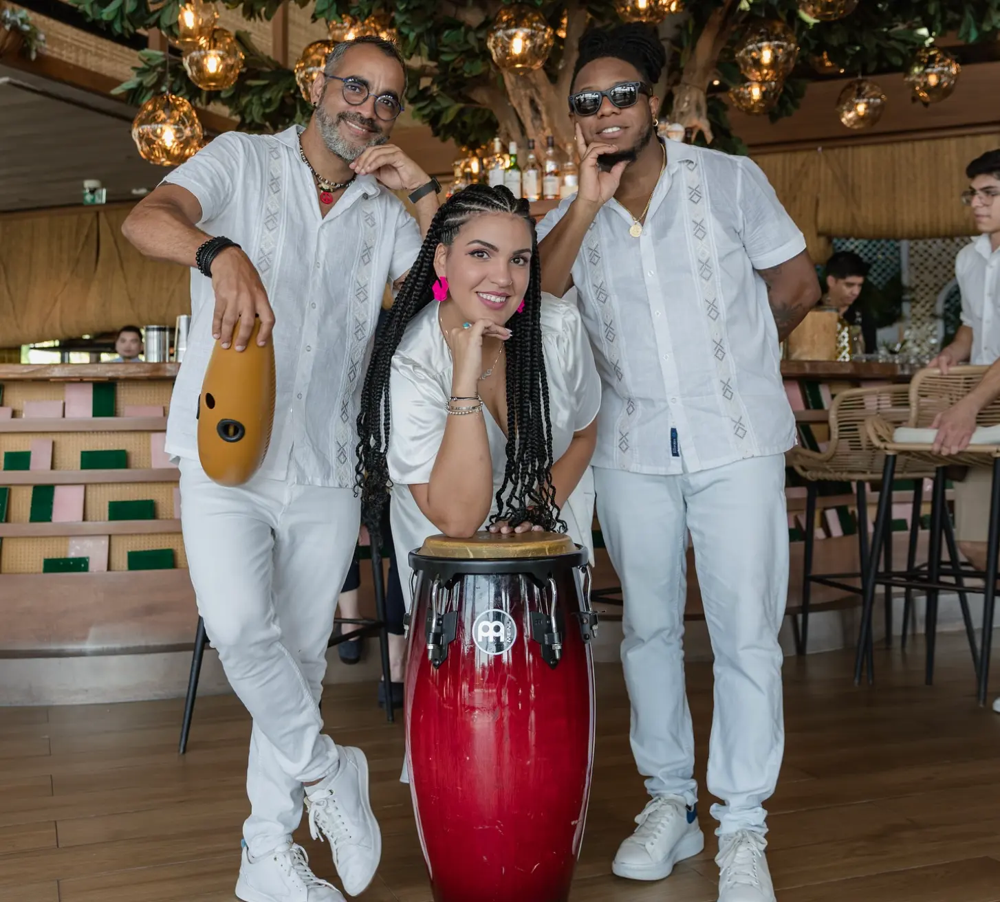 Sabroso Sundays trio in white with conga and shaker at TAMOKA Dubai in JBR